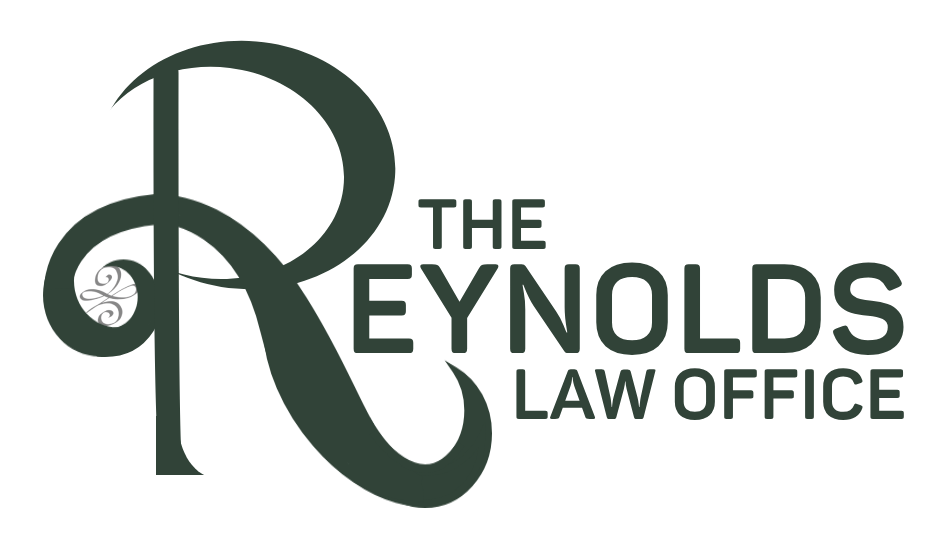 The Reynolds Law Office logo featuring a stylized Celtic “R”